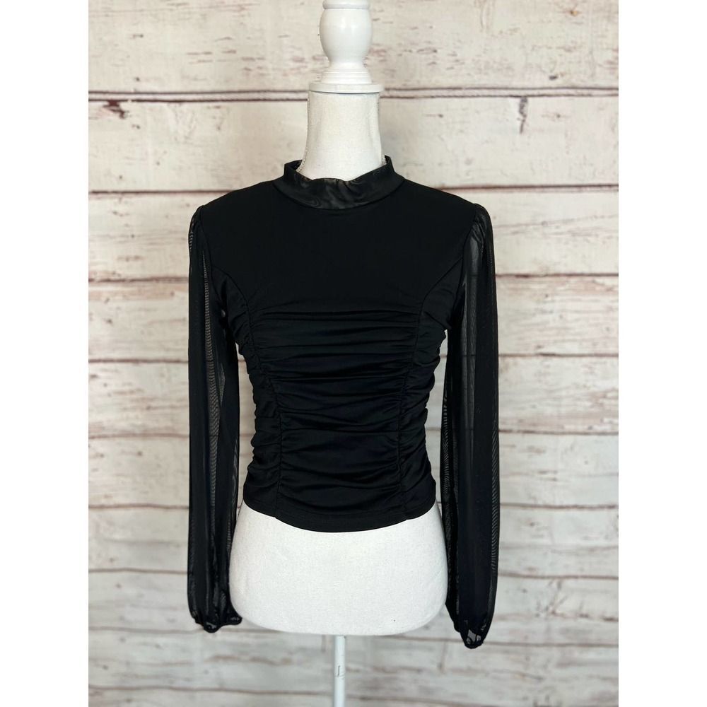 Woman’s black blouse boutique small